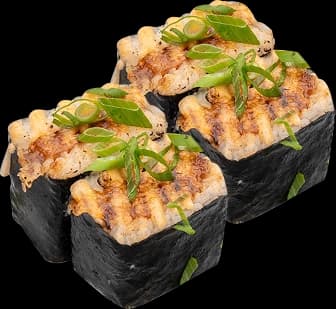 Spam brûlée musubi topped with green onion