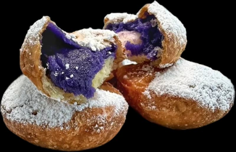 Powdered ube beignets with purple ube filling